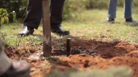 Finishing cement marker beacon, plot of land Kenya, Africa, close up Stock Footage 51521638