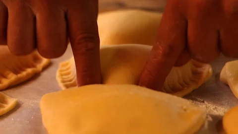 Finishing detailing pie for baking Stock Footage 130087060