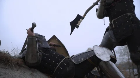 Finishing an enemy with a halberd Stock Footage 81669138