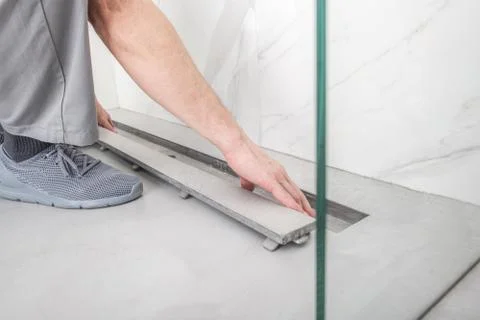Finishing Linear Shower Drain.  Stock Photos
