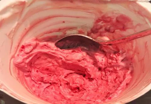 Finishing Raspberry Yogurt Stock Photos
