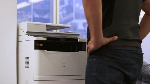 Finishing a scan with the multifunction printer on the office 動画素材 95749306
