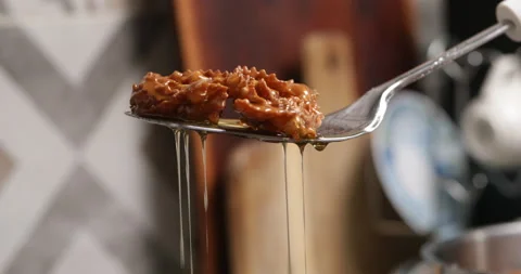 The finishing touch: chebakia dipped in syrup Stock Footage 236546387