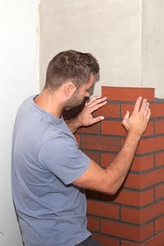 Finishing work on the new facade. Stock Photos