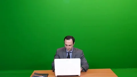Finishing up work in the Office on Green Screen Stock Footage 83734523