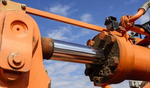 Finland-05/07/2005: Front loader bucket's hydraulic actuator Stock Photos