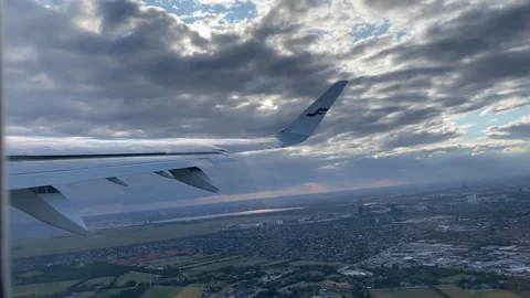 Finnair wing on cloudy sky Stock Footage 246454368