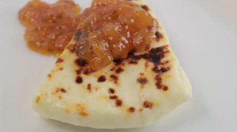 Finnish cheese with fresh cloudberries Stock Footage 60406206