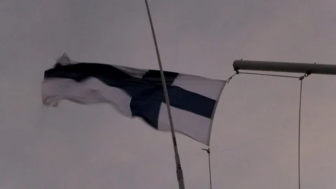 Finnish Flag blowing in strong wind Stock Footage 113369874