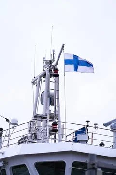 Finnish flag on a ship Stock Photos