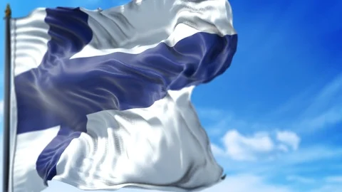 Finnish Flag is Waving Against Blue Sky Stock Footage 118024658