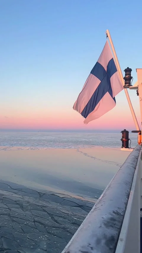 Finnish Flag Waving on Ferry Deck Between Helsinki and Tallinn in Winter Over Stockbeeldmateriaal 331095576