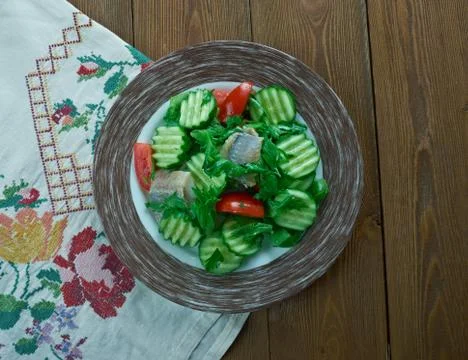 Finnish vegetable salad with fish Фото