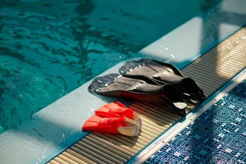 Fins at the poolside, scuba gear, diving equipment Stock Photos
