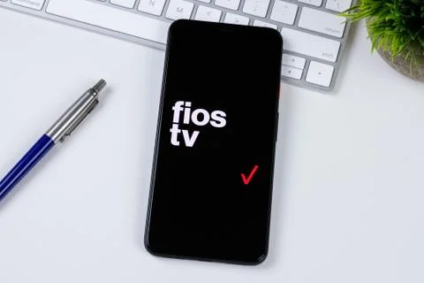Fios TV app logo on a smartphone screen Stock Photos