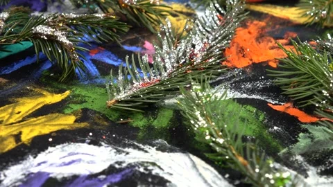 Fir branches sprinkled with silver glitter are on black pattern fabric Stock Footage 282535073