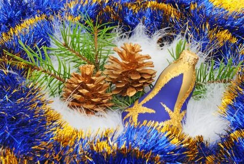 Fir cones on the swan's down Stock Photos