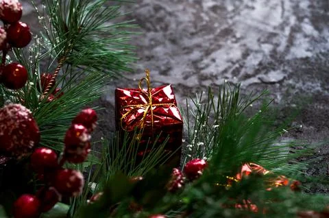 Fir tree branches and gift boxes on dark background. Banner with place for .. 写真素材