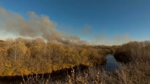 Fire across the river Stock Footage 97393708