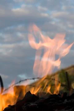 Fire against the sky Stock Photos