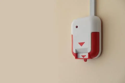 Fire alarm switch on light wall indoors. Space for text Foto stock