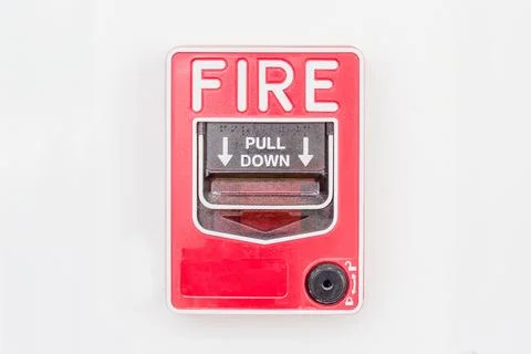 Fire alarm switch on white wall as background for warning and security system Stock Photos