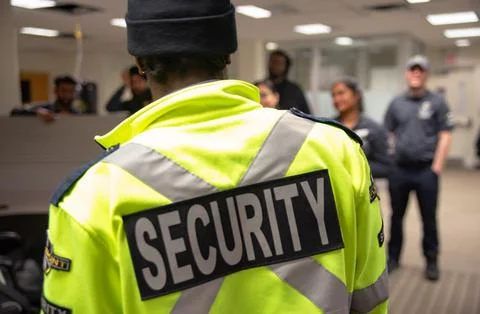 Fire Alarm training class by security guard in office Stock Photos