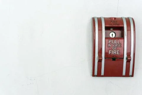 Fire alarm on the wall Stock Photos