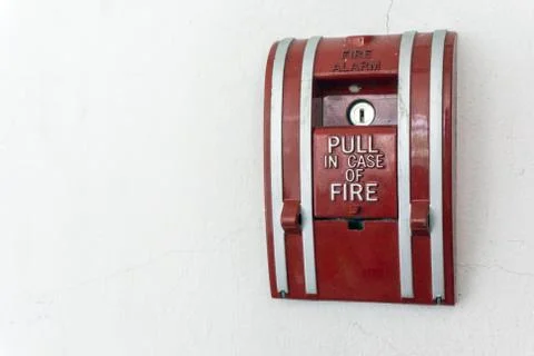 Fire alarm on the wall Stock Photos