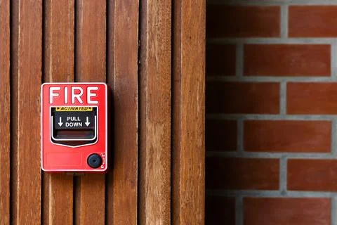 Fire Alarm zone alert warning switch pull stations, wall mount around build.. Stock Photos