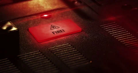 Fire alert symbol light flashing on metal control panel lamp Stock Footage 334970213