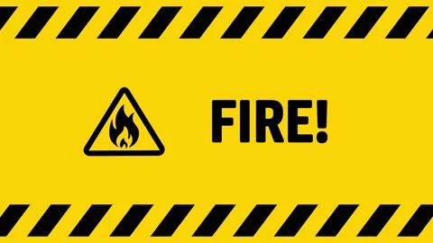 Fire alert symbol on yellow background screen Stock Footage 334970073