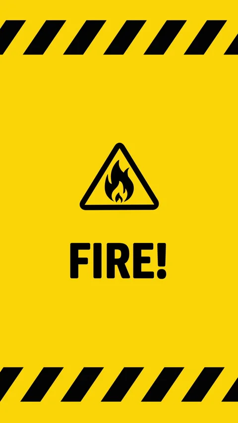 Fire alert symbol on yellow background screen vertical Stock Footage 334970105