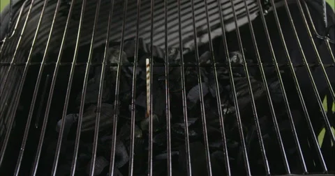 Fire and Burning Coals in BBQ Grill Close Up Stock Footage 211769128