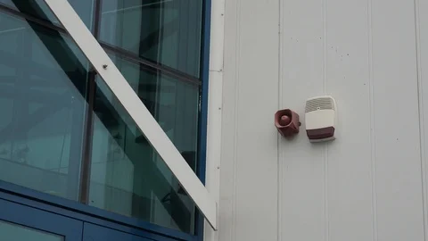 Fire and efraction alarm units on the building Stock Footage 106028372