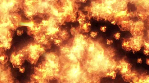 Fire and flames. A background of solid tongues of flame on a black screen. Stock Footage 236777513