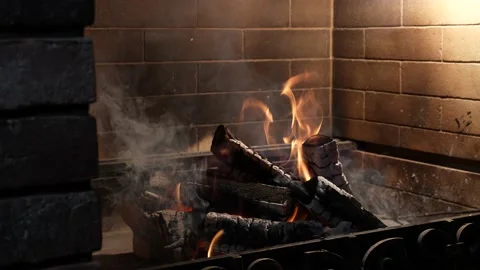 Fire and flames. Burning wood eith coals. Heat and sparks. Fireplace with bricks Stock Footage 188451807