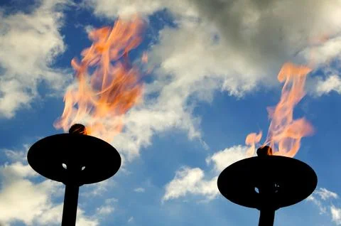 Fire and Ice The problem Man continues to burn fossil fuels here needlessly a Stock Photos