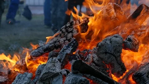 Fire and people in the background Stock Footage 124314872