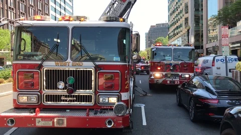 Fire and Rescue Trucks with Flasing lights at Incident Stock Footage 89631696