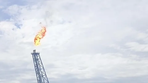 Fire and smoke from a tower rig offshore Stock Footage 336675564