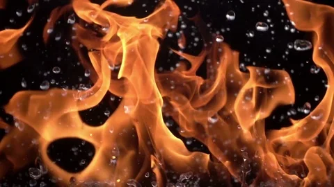 Fire and Water. Slow movement of fire and water. Fire and water collide  Stock Footage 76894007