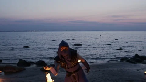 Fire artist dancing with a sword set on fire. Stock Footage 144676729