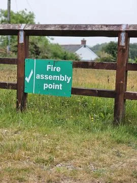 Fire assembly point sign Stock Photos
