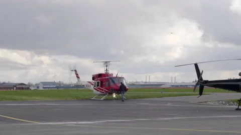Fire Attack Helicopter On The Airfield Ready To Lift-off For Rescue Stock Footage 166607202