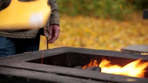 Fire in the autumn forest. Danger of forest fire - smoke and flame. Barbecue Stock Footage 84594508