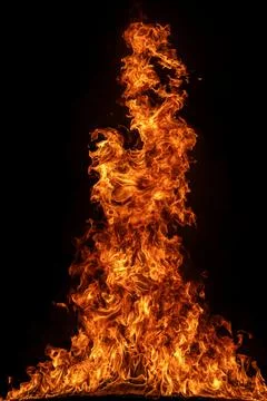 Fire background with rising flames. Fire texture bright and glowing. Fire b.. Stock Photos