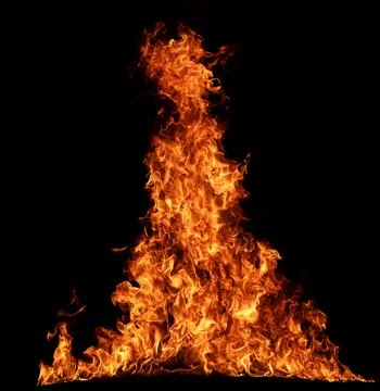 Fire background with rising flames. Fire texture bright and glowing. Fire b.. Stock Photos