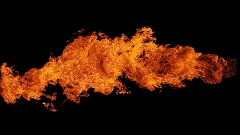 Fire ball explosion from right to left, isolated on black background Stock Footage