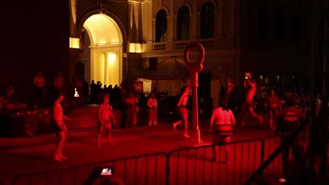 Fire ball performance scoring through hoop at Merida Fest 2026 Stock Footage 331172421
